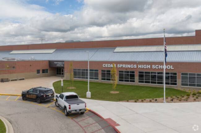 Parking lot and front entrance of a high school